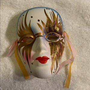Pink and gold Mardi Gras mask